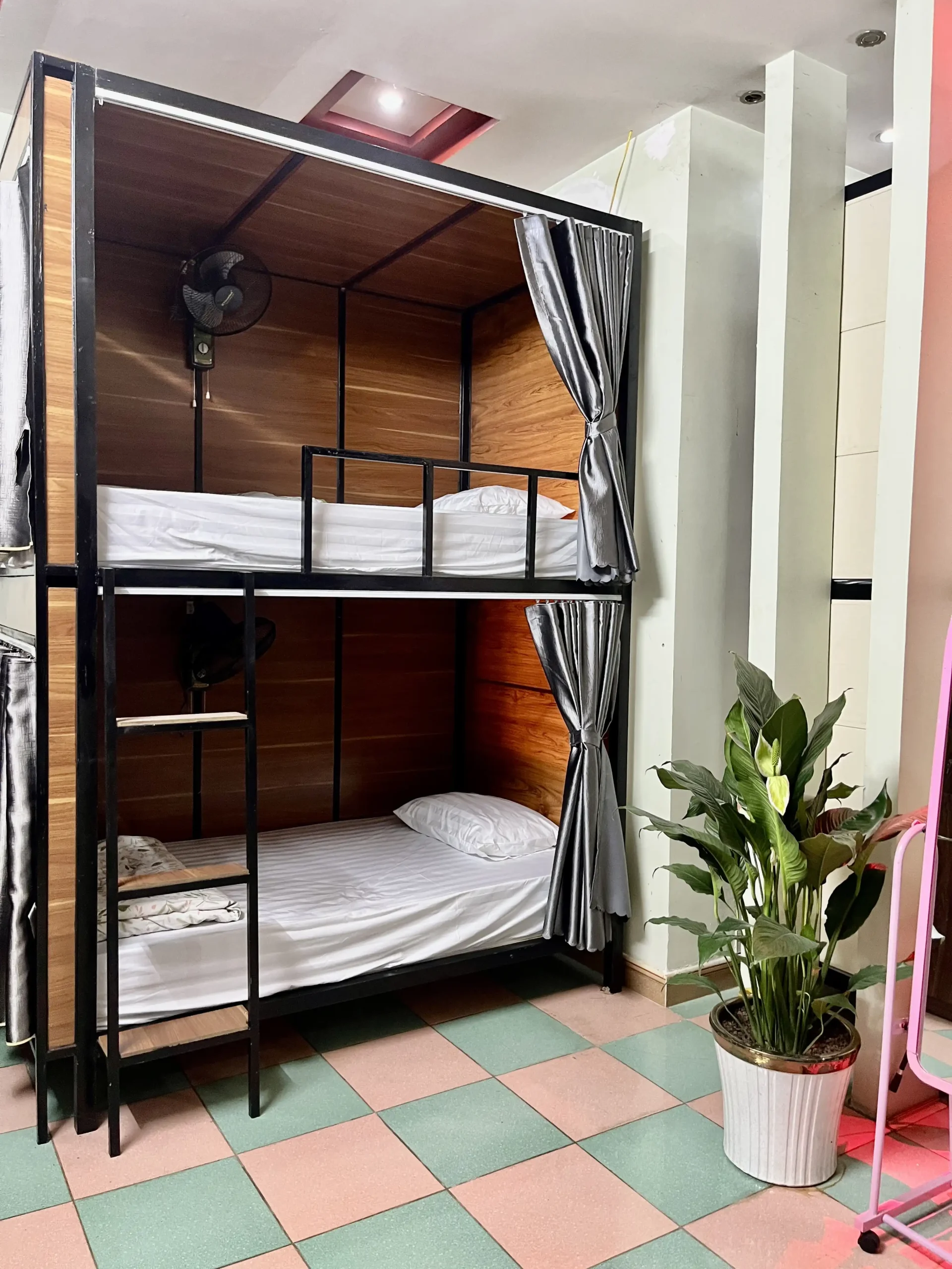 Loop Trails Hostel dorm beds in Ha Giang City — base for the loop tour